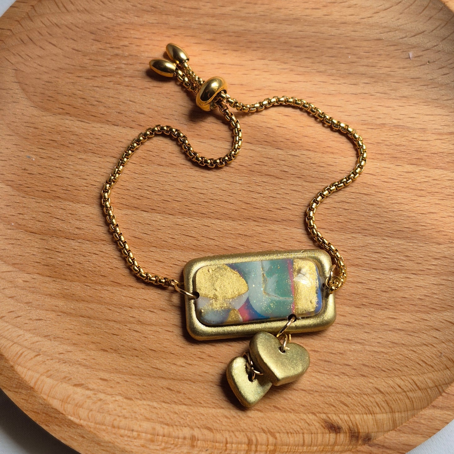 Pulsera “Corazones Dorados”