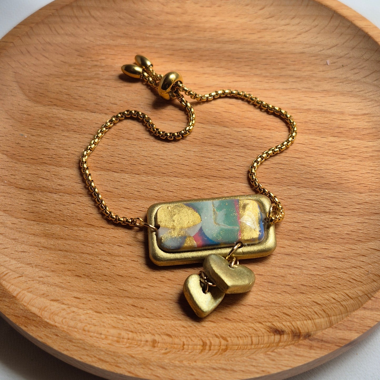 Pulsera “Corazones Dorados”